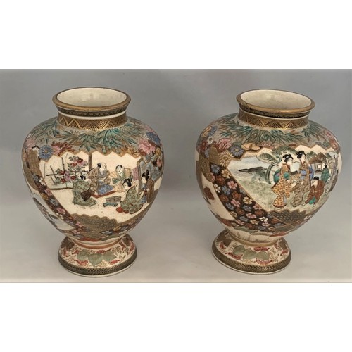 75 - Pair of Japanese Satsuma vases, Meiji period, of squat globular form, profusely decorated in gilt an... 