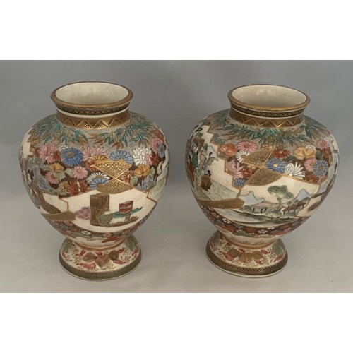 75 - Pair of Japanese Satsuma vases, Meiji period, of squat globular form, profusely decorated in gilt an... 