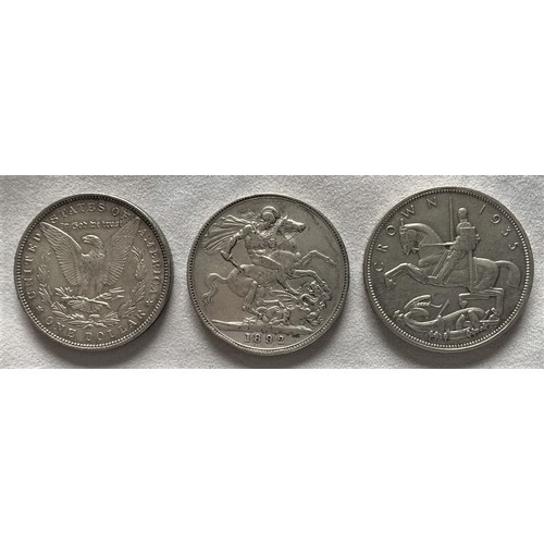 82 - American One Dollar dated 1890, two British Crowns dated 1892 and 1935 (3).