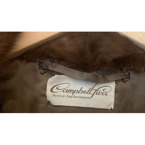 88 - A faux fur jacket by Campbell Furs of Bournemouth, with two hook fastenings and internal pocket.