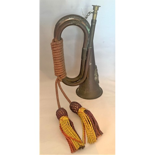 113 - A Military regimental copper and brass bugle, with applied badge The Argyll and Sutherland Highlande... 