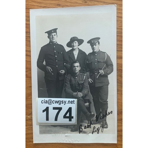 174 - RP postcard by Norman Grut Guernsey, studio portrait, three military gentleman and a lady.