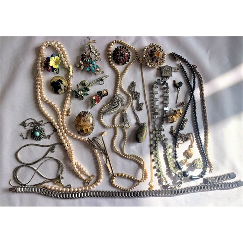 86 - A quantity of dress jewellery in a jewellery box.