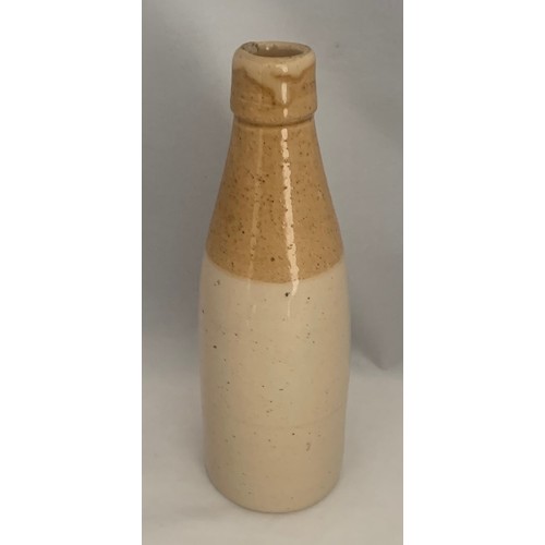 26 - R.W.Randall Guernsey, two tone stoneware Ginger Beer bottle, champagne shape.