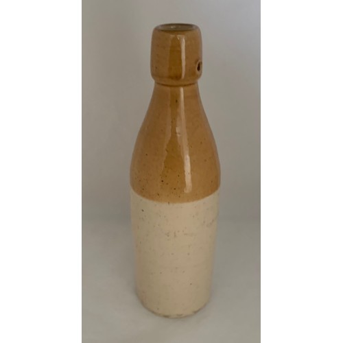 35 - Guernsey two tone stoneware, with black transfer 'E & W Guppy Stone Ginger Beer Guernsey'.