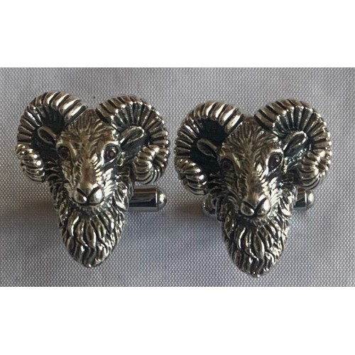 89 - Pair of Sterling silver cufflinks in the form of Ram's heads.