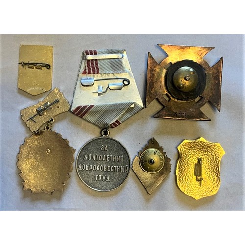 57 - Various Russian and other badges and medals (6).