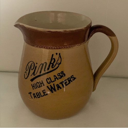 103 - Pink's Chichester Sussex, 'Pink's High Class Table Waters', two tone stoneware pub jug, 14 cm high a... 