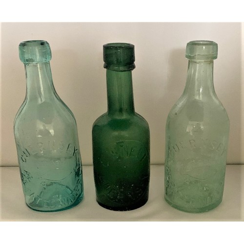 104 - C.Snell & Son Guernsey, green glass bottle 19 cm high, together with two Guernsey Aerated Water clea... 