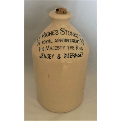 105 - A Guernsey stoneware flagon, white glaze, with black transfer 'Le Riches Stores Ltd. By Royal Appoin... 