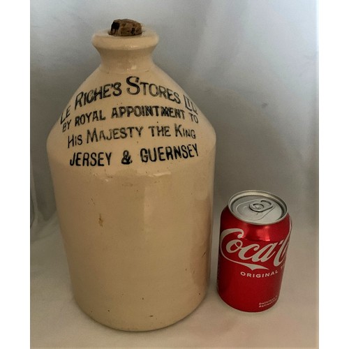 105 - A Guernsey stoneware flagon, white glaze, with black transfer 'Le Riches Stores Ltd. By Royal Appoin... 