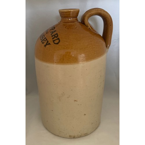 107 - A Guernsey two tone stoneware flagon by Price Bristol, with black transfer 'A Sheppard Guernsey', on... 