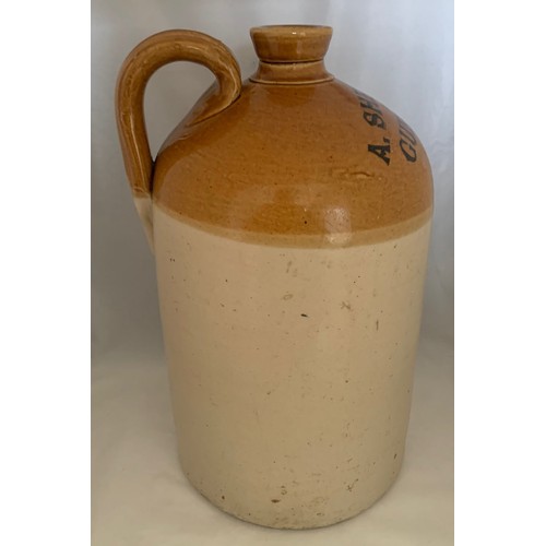 107 - A Guernsey two tone stoneware flagon by Price Bristol, with black transfer 'A Sheppard Guernsey', on... 