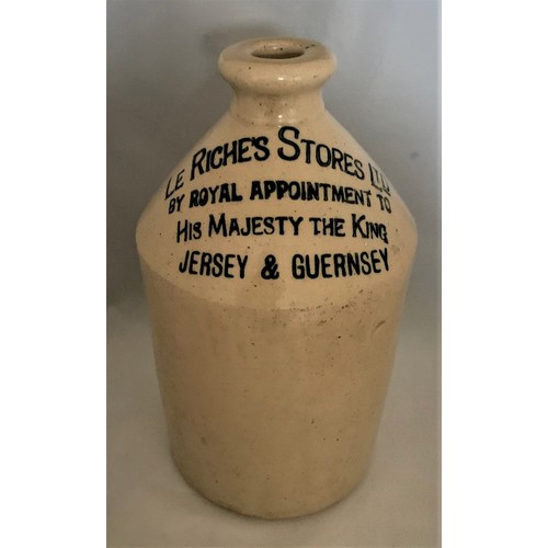 109 - A Guernsey white glazed stoneware flagon with black transfer 'Le Riches Stores Ltd. By Royal Appoint... 