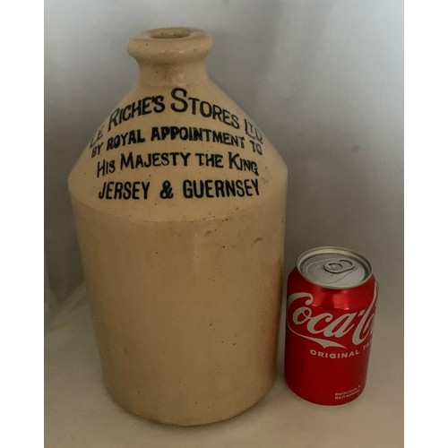 109 - A Guernsey white glazed stoneware flagon with black transfer 'Le Riches Stores Ltd. By Royal Appoint... 