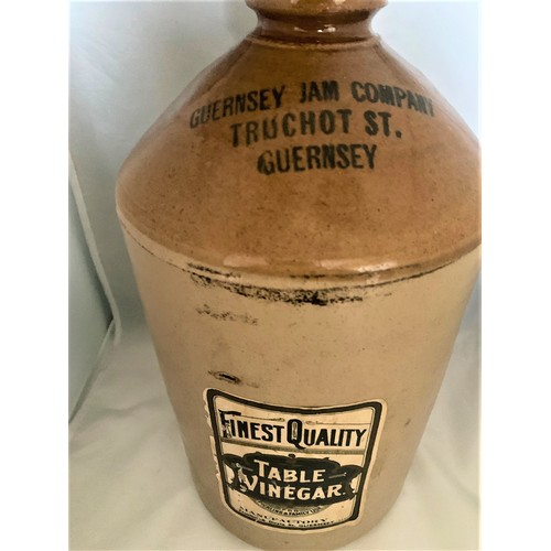 133 - Guernsey two tone stoneware flagon, with black transfer  'Guernsey Jam Company Truchot St. Guernsey'... 