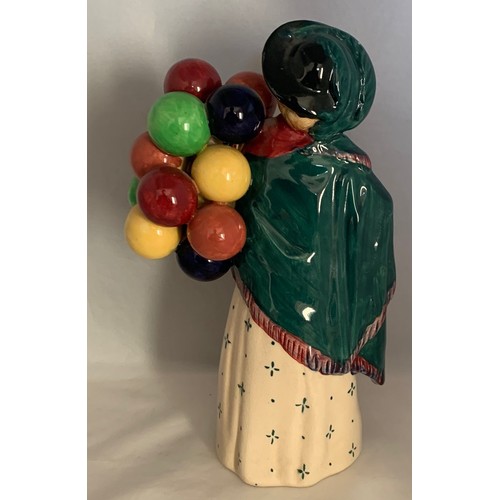 126 - Royal Doulton figure, The Balloon Seller, early edition, standing, model number HN 583 and impressed... 