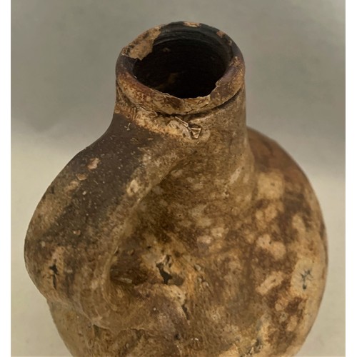 120 - A rare 17th century English small oil bottle, 17th century,  of baluster form, 14.5 cm high, a./f.