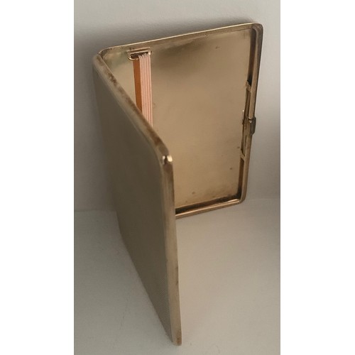 55 - A 9 carat gold cigarette case, Birmingham 1927 by William Neale, of oblong form with exterior engine... 