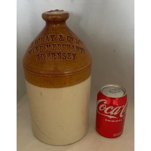 113 - A Guernsey two tone stoneware flagon, by Doulton & Co. Ltd. impressed 'Mackay & Co. Ltd Wine Merchan... 