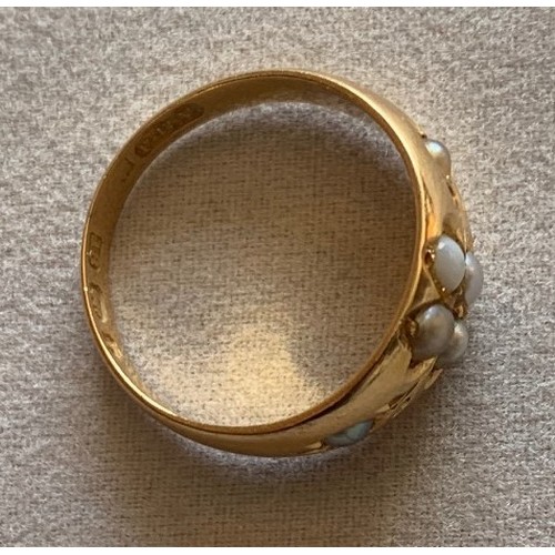 105 - 18 carat gold and seed pearl ring, weight 4 grams.