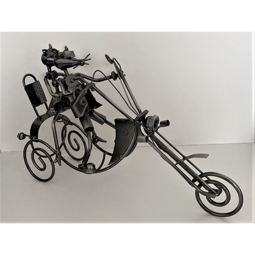 75 - A recycled metalware motorcycle with driver and pillion, 40 cm wide