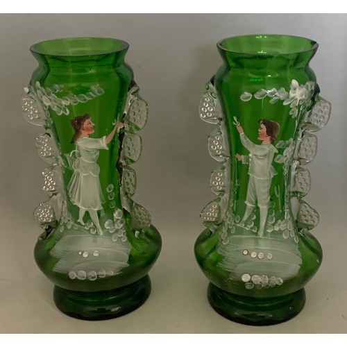 23 - Pair of Mary Gregory green glass vases, one a.f. 18 cm high.