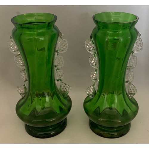 23 - Pair of Mary Gregory green glass vases, one a.f. 18 cm high.