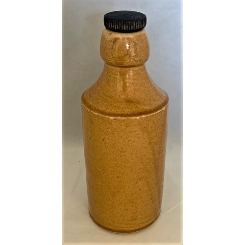 50 - A scarce Jersey ginger beer bottle with a honey coloured glaze, transfer printed 'Ann Street Brewery... 