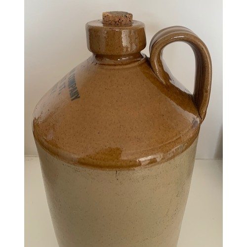 71 - Stoneware two tone flagon, Guernsey Jam Company Truchot Street, 13.5 in 34 cm high.