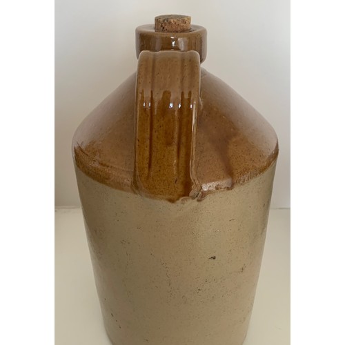 71 - Stoneware two tone flagon, Guernsey Jam Company Truchot Street, 13.5 in 34 cm high.