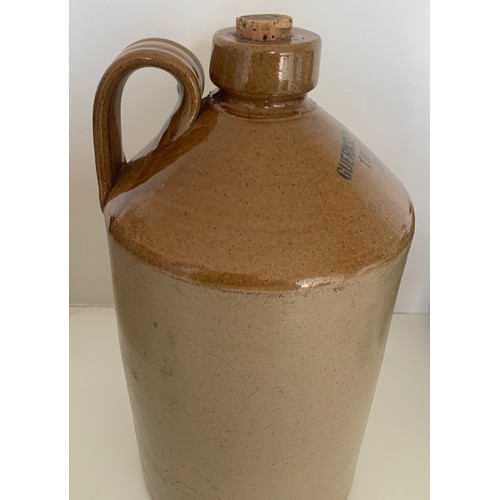 71 - Stoneware two tone flagon, Guernsey Jam Company Truchot Street, 13.5 in 34 cm high.