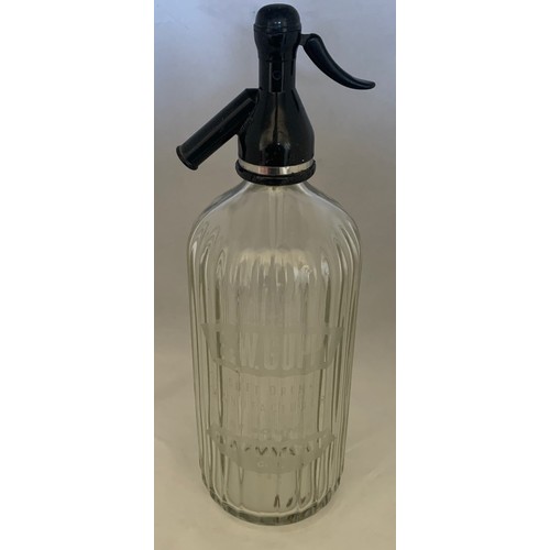 37 - A clear glass soda syphon, acid etched E.W.Guppy, St John's Guernsey, 31 cm high.