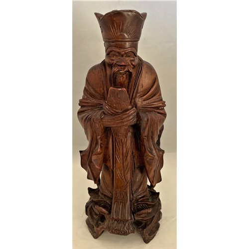 75 - Chinese finely carved hardwood figure depicting a Sage, 20cm high.