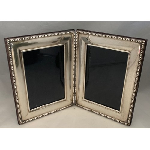 76 - Modern silver double photograph frame, 13 x 21 cm.