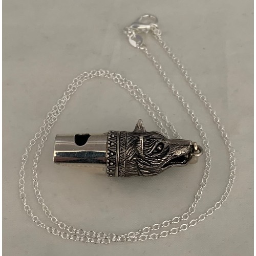 80 - Silver whistle in the form of a dog on a silver chain.