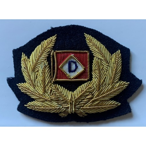 107 - Onesimus Dorey Guernsey, Merchant Shipping cap badge, 8 cm wide.