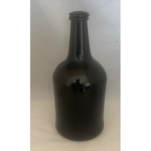 54 - 18th century black glass cylinder bottle, 24 cm high.