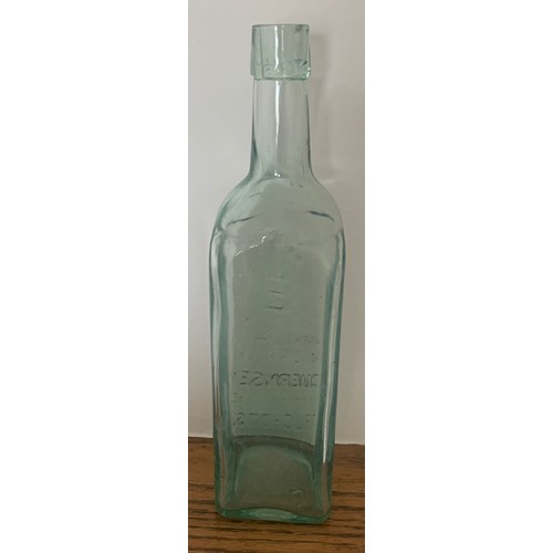 103 - Guernsey clear glass bottle with Coat of Arms, 'ST Sarnian Tonic Sole Makers Guernsey Aerated Water ... 