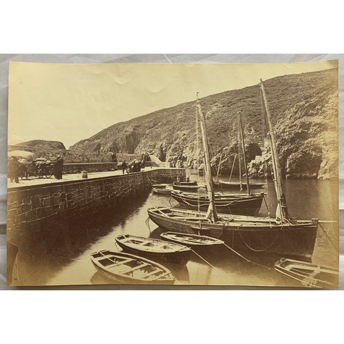 57 - A paddle steamer outside the Creux Harbour Sark, together with two interior of harbour photographs, ... 