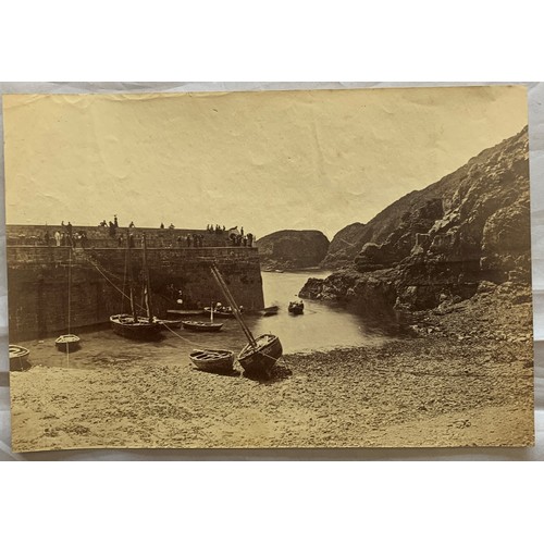 57 - A paddle steamer outside the Creux Harbour Sark, together with two interior of harbour photographs, ... 