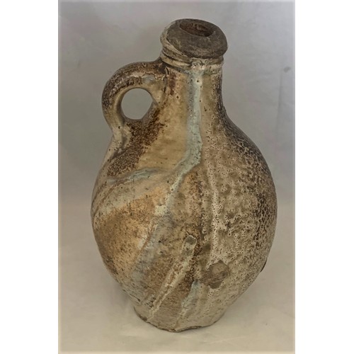 8 - A German late 17th century/early 18th century salt glazed stoneware wine flagon with part mottled gl... 