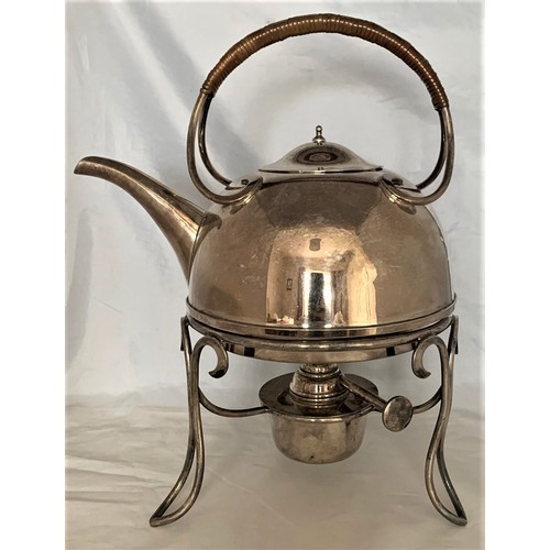 46 - An Arts and Crafts silver plated spirit kettle, in the manner of  Christopher Dresser, with wicker c... 