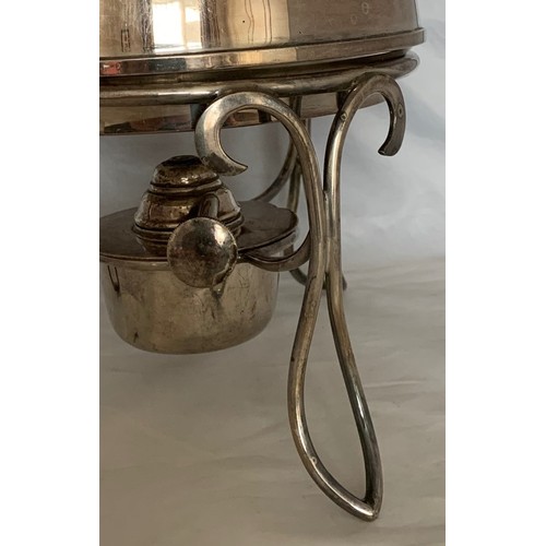 46 - An Arts and Crafts silver plated spirit kettle, in the manner of  Christopher Dresser, with wicker c... 