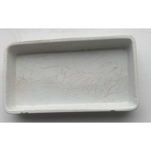 34 - Oblong shaped Pot Lid, brown print, Au Bon Marche Paris, Pate Dentifrice, 8.5 x 4.5 cm.