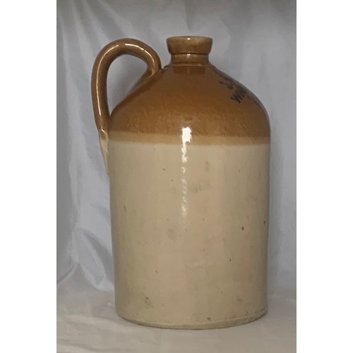 20 - A very rare stoneware two tone  flagon, J.L.Pells Wine Merchant Guernsey circa 1890, 32 cm high.