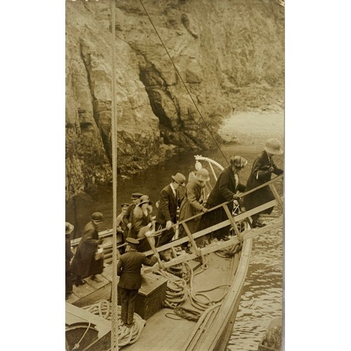 175 - Two sepia postcards, passengers disembarking from boats at Creux Harbour Sark, circa 1910.