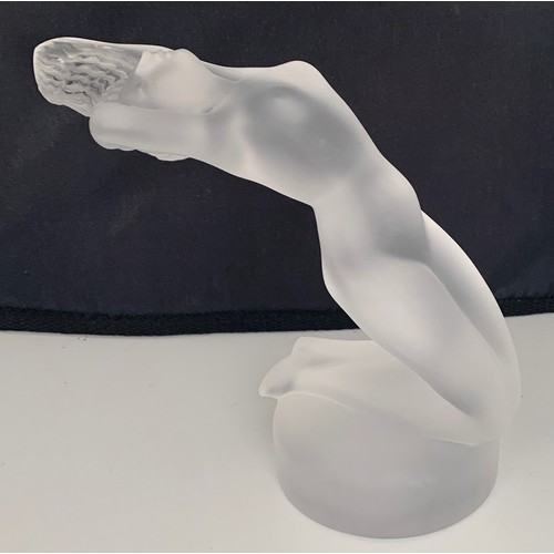 63 - Lalique opalescent glass female form figure, Chrysis, set on a circular foot, the base with Lalique ... 