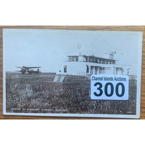 300 - Real Photographic postcard, Old Terminal and Bi-Plane at Guernsey Airport.