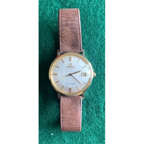 70 - Cased Omega Automatic wrist watch with strap.